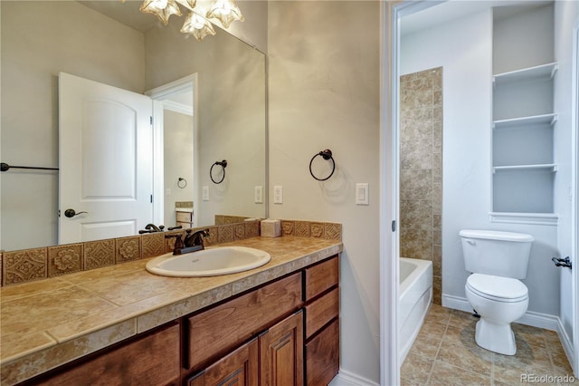 bathroom featuring toilet, a notable chandelier, vanity, baseboards, and washtub / shower combination