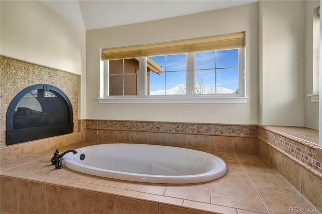 full bath featuring a garden tub