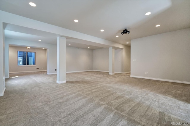 basement with baseboards, carpet flooring, and recessed lighting