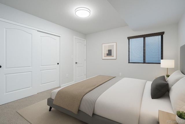 carpeted bedroom featuring a closet