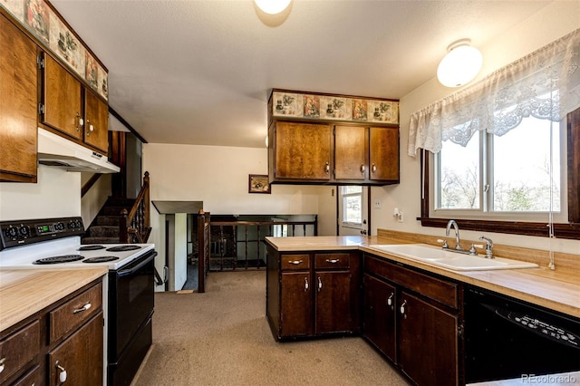 kitchen featuring range with electric stovetop, under cabinet range hood, dishwasher, and light countertops