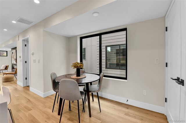 2164 S Ash St, Denver, CO 80222 - dining area featuring light wood-type flooring, baseboards, and recessed lighting