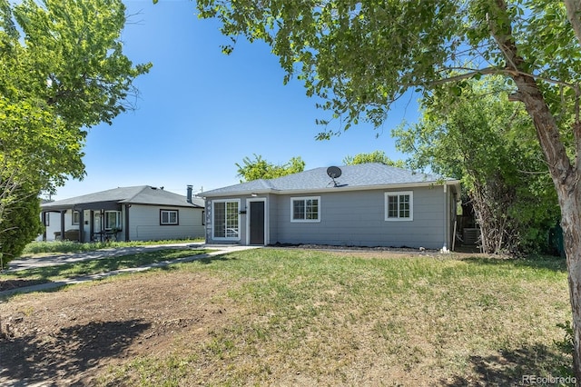 967 Victor St, Aurora, CO 80011 - rear view of house with a lawn and central air condition unit