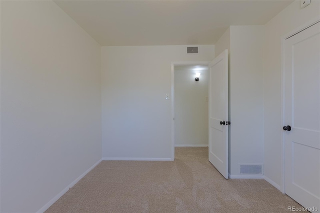 967 Victor St, Aurora, CO 80011 - spare room featuring light carpet and baseboards