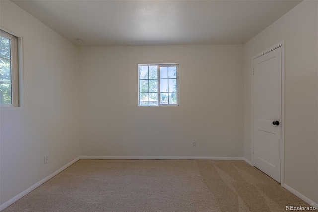 967 Victor St, Aurora, CO 80011 - empty room with light carpet and baseboards