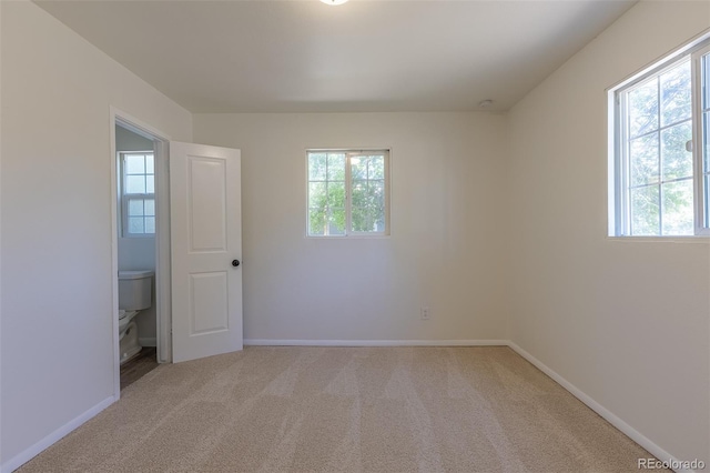 967 Victor St, Aurora, CO 80011 - carpeted empty room featuring baseboards