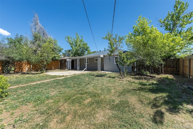 967 Victor St, Aurora, CO 80011 - rear view of property featuring a patio