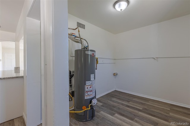 967 Victor St, Aurora, CO 80011 - utility room featuring gas water heater