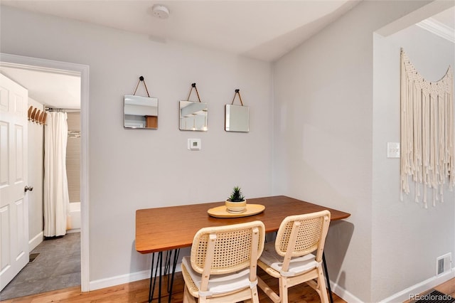 3175 S Pennsylvania St, Englewood, CO 80113 - dining room featuring baseboards, light wood-style floors, and breakfast area