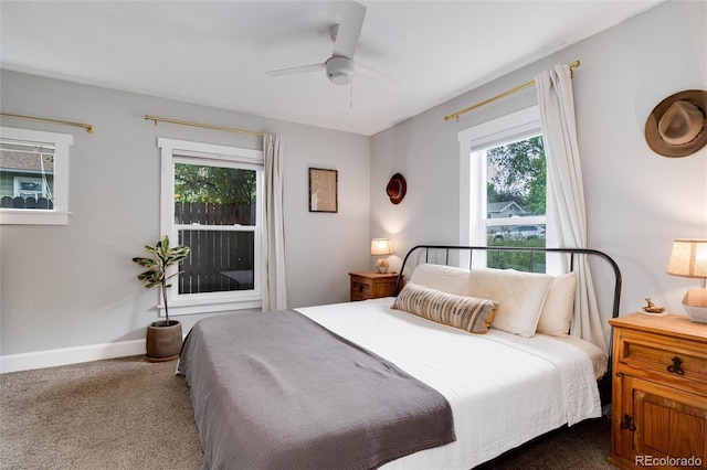 3175 S Pennsylvania St, Englewood, CO 80113 - carpeted bedroom with multiple windows, a ceiling fan, and baseboards