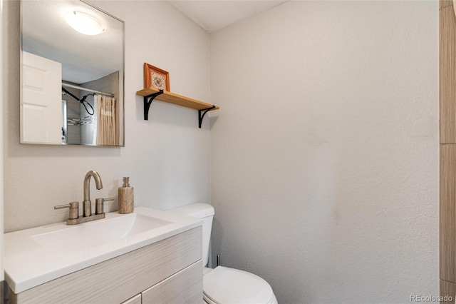 3175 S Pennsylvania St, Englewood, CO 80113 - full bath with toilet, vanity, and a shower with shower curtain