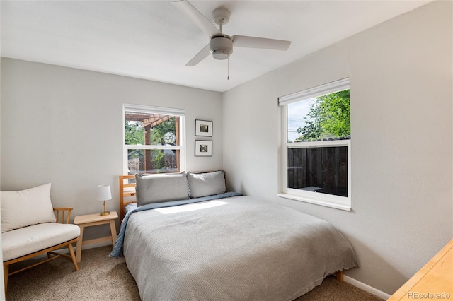 3175 S Pennsylvania St, Englewood, CO 80113 - carpeted bedroom with baseboards and a ceiling fan