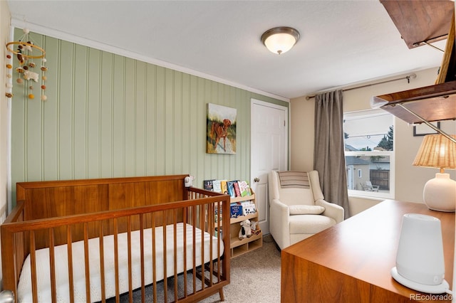 3175 S Pennsylvania St, Englewood, CO 80113 - carpeted bedroom with a crib and ornamental molding