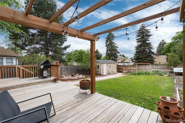 3175 S Pennsylvania St, Englewood, CO 80113 - wooden deck featuring grilling area and a pergola