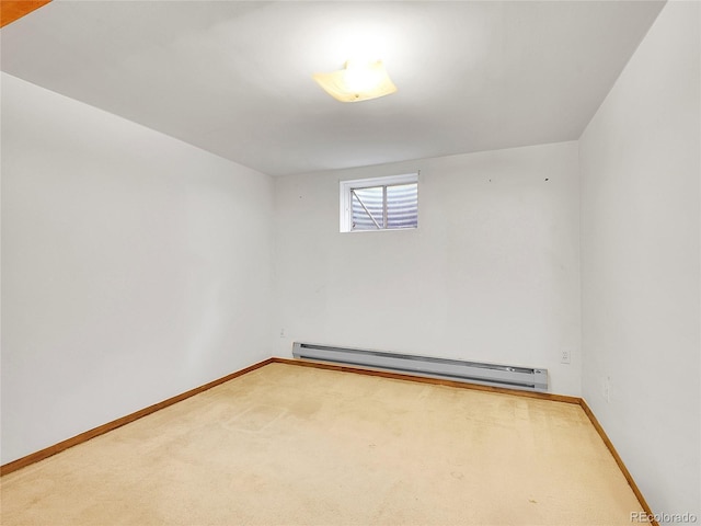 interior space featuring carpet flooring, baseboards, and baseboard heating