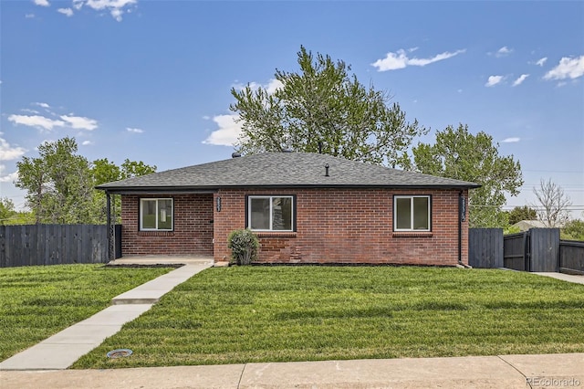 2823 W Archer Pl, Denver, CO 80219 - view of front facade with brick siding and roof with shingles