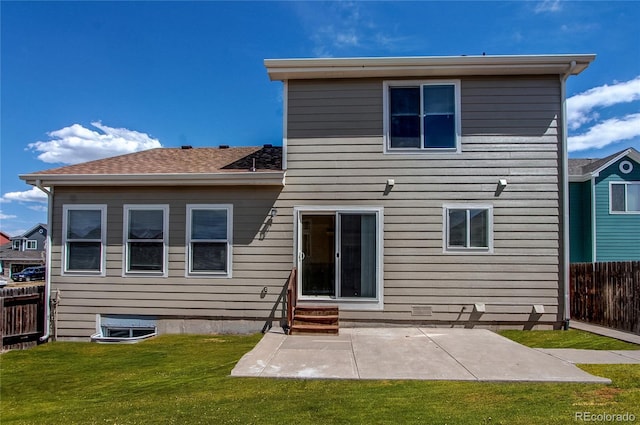 5549 Helena St, Denver, CO 80239 - back of property with a yard, a patio area, entry steps, and fence