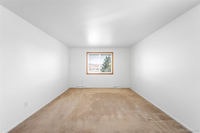 12940 W 75th Ave, Arvada, CO 80005 - unfurnished room with light carpet and baseboards