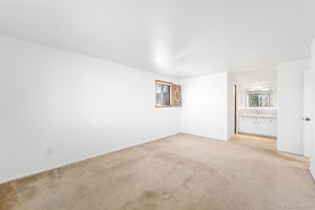 12940 W 75th Ave, Arvada, CO 80005 - unfurnished room with light carpet and baseboards