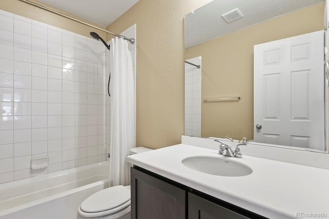 full bath featuring shower / bathtub combination with curtain, toilet, vanity, and a textured wall