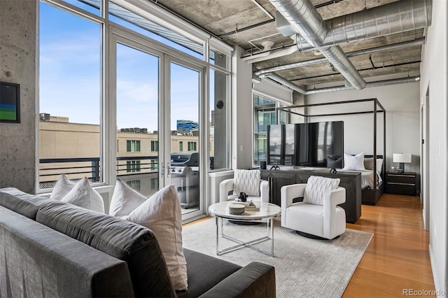1401 Wewatta St Unit 911, Denver, CO 80202 - living area featuring wood finished floors