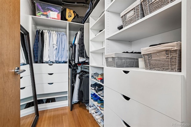 1401 Wewatta St Unit 911, Denver, CO 80202 - walk in closet with wood finished floors