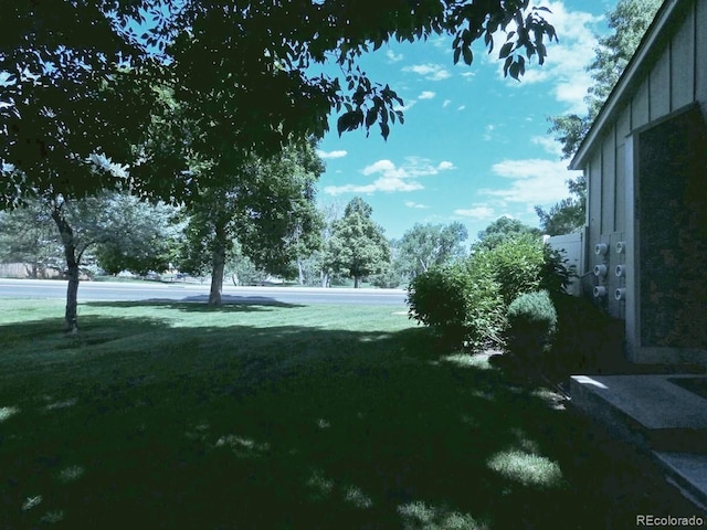 9669 W Chatfield Ave Unit A, Littleton, CO 80128 - view of grassy yard