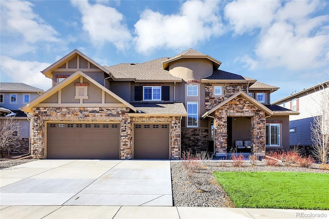 view of front of home with a garage and a front yard