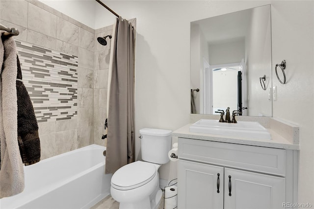 full bathroom featuring vanity, shower / bathtub combination with curtain, and toilet