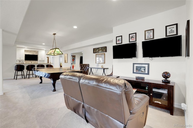 living room with light colored carpet and pool table