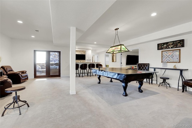 playroom featuring light colored carpet