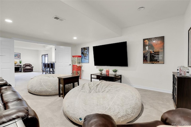 living room featuring light carpet