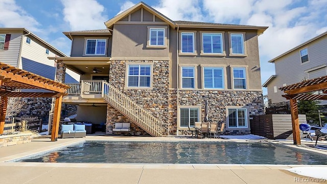 back of house with an outdoor hangout area, a patio area, and a pergola