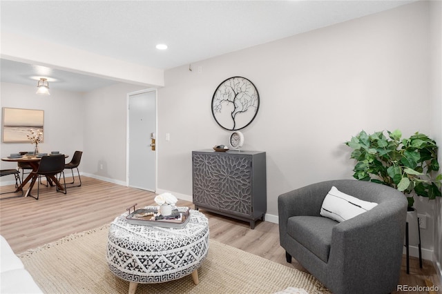 16359 W 10th Ave Unit T1, Golden, CO 80401 - living area with wood finished floors, recessed lighting, and baseboards