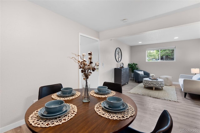 16359 W 10th Ave Unit T1, Golden, CO 80401 - dining space with baseboards, wood finished floors, and recessed lighting