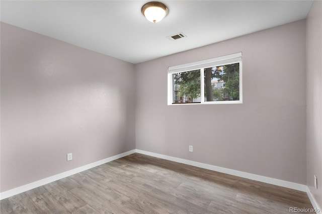 16359 W 10th Ave Unit T1, Golden, CO 80401 - empty room featuring baseboards and wood finished floors