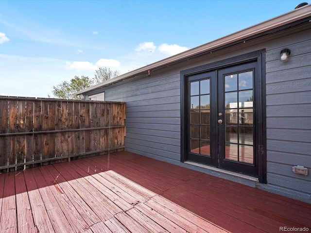 wooden terrace featuring french doors