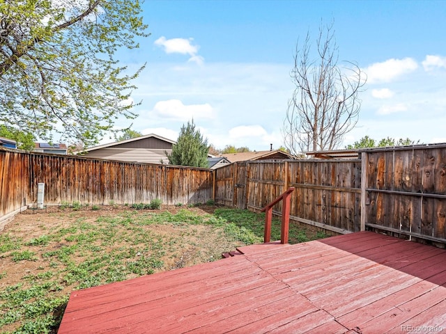 deck featuring a fenced backyard