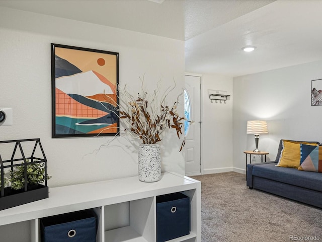 interior space featuring carpet
