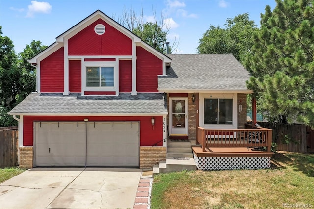 1024 Bromefield Dr, Fountain, CO 80817 - view of front of property with a shingled roof, brick siding, an attached garage, and concrete driveway