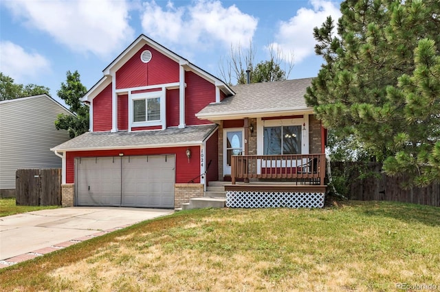 1024 Bromefield Dr, Fountain, CO 80817 - view of front of home featuring brick siding, a garage, driveway, roof with shingles, and covered porch