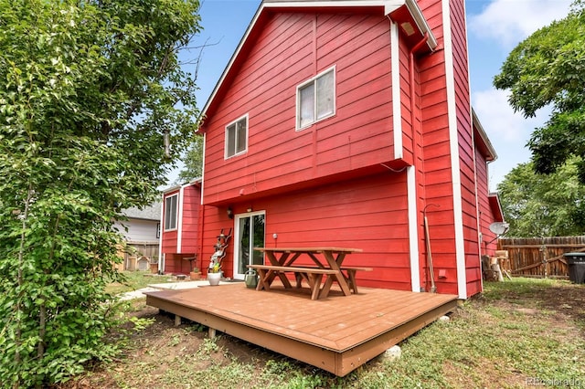 1024 Bromefield Dr, Fountain, CO 80817 - rear view of house with a wooden deck