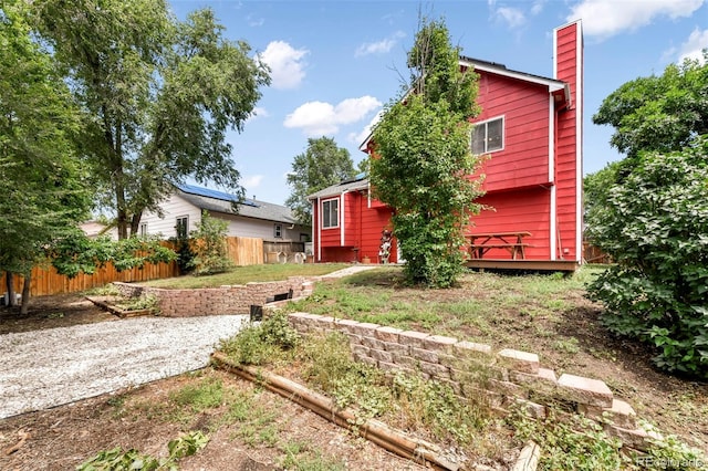 1024 Bromefield Dr, Fountain, CO 80817 - rear view of property with a chimney