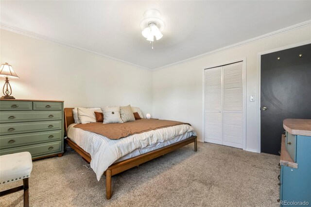 1024 Bromefield Dr, Fountain, CO 80817 - bedroom with crown molding, light carpet, and a closet