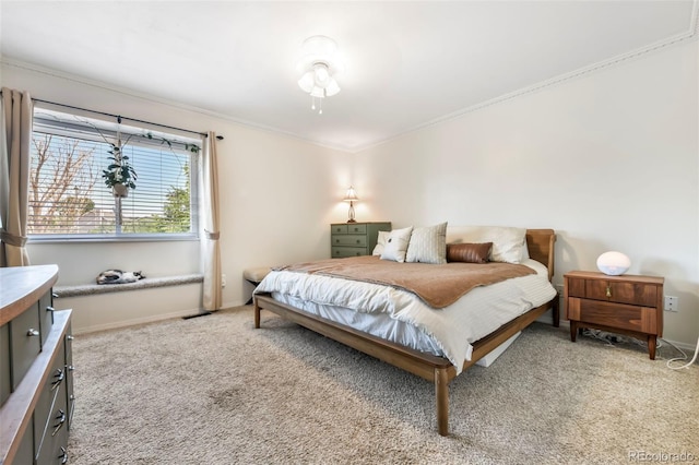 1024 Bromefield Dr, Fountain, CO 80817 - bedroom with light carpet and ornamental molding