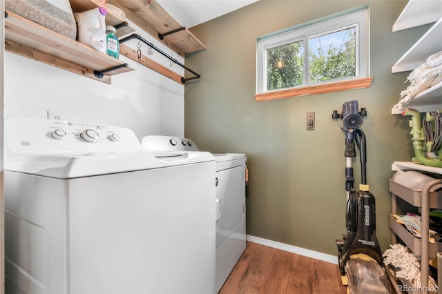 1024 Bromefield Dr, Fountain, CO 80817 - laundry room featuring independent washer and dryer and wood finished floors