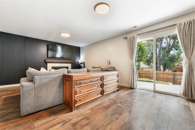 1024 Bromefield Dr, Fountain, CO 80817 - living area with wood finished floors and a fireplace