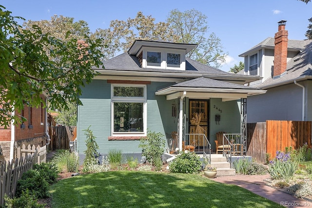 2445 N Franklin St, Denver, CO 80205 - view of front of home featuring a shingled roof
