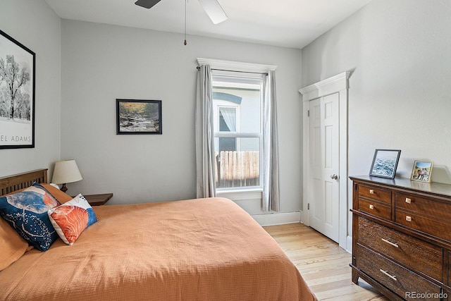 2445 N Franklin St, Denver, CO 80205 - bedroom with light wood-style floors and ceiling fan