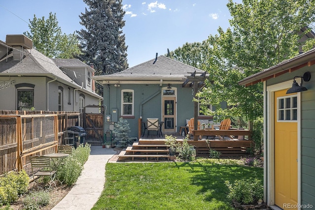 2445 N Franklin St, Denver, CO 80205 - rear view of house with brick siding and a wooden deck